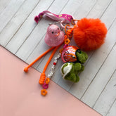 Grigri de sac tortue orange et rose