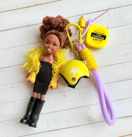 Grigri de sac poupée jaune et violette