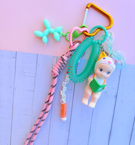 Grigri de sac sonny angel vert livre