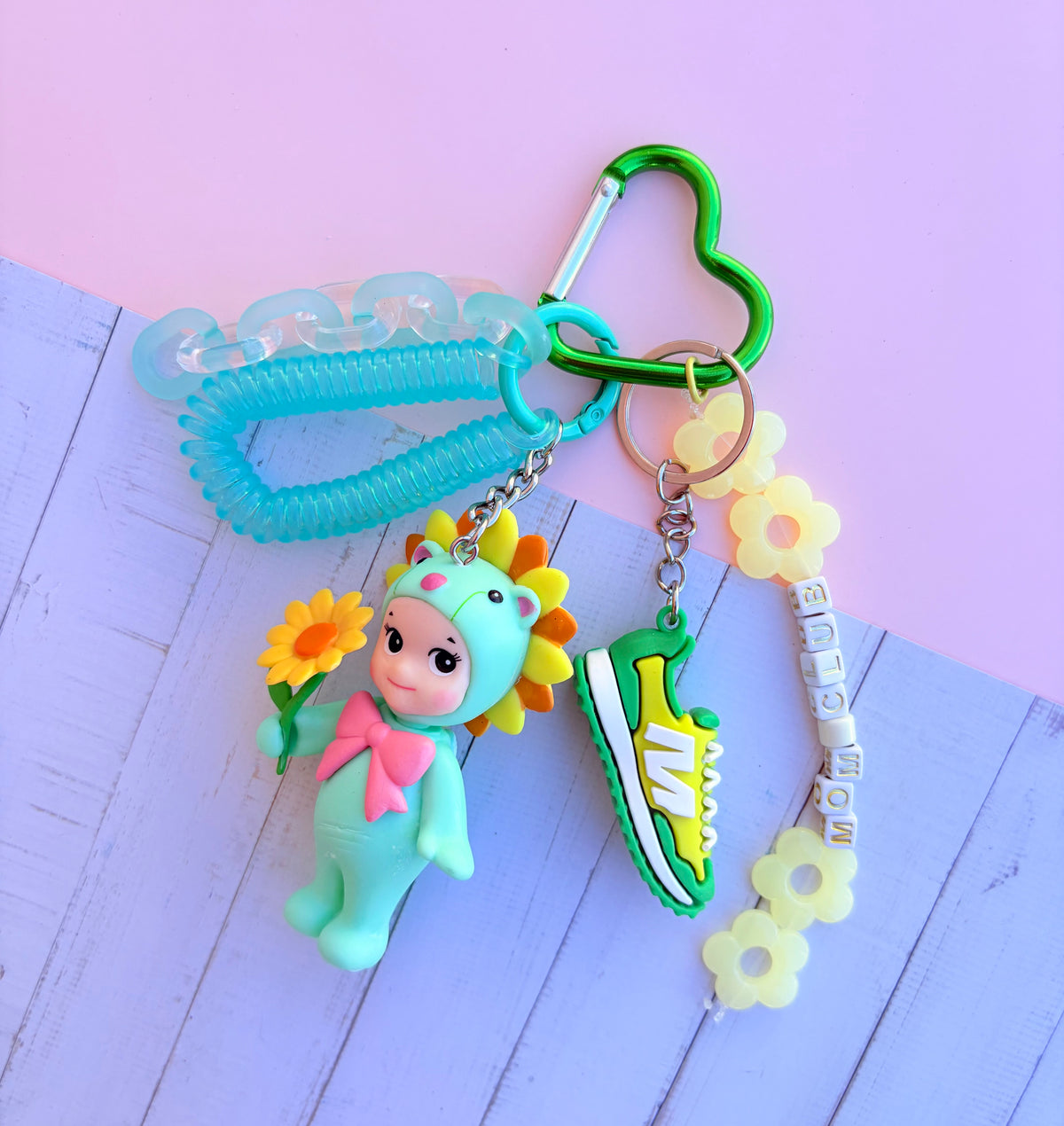Grigri de sac sonny angel fleur vert