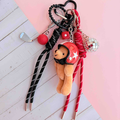 Grigri de sac ours rouge golfeur