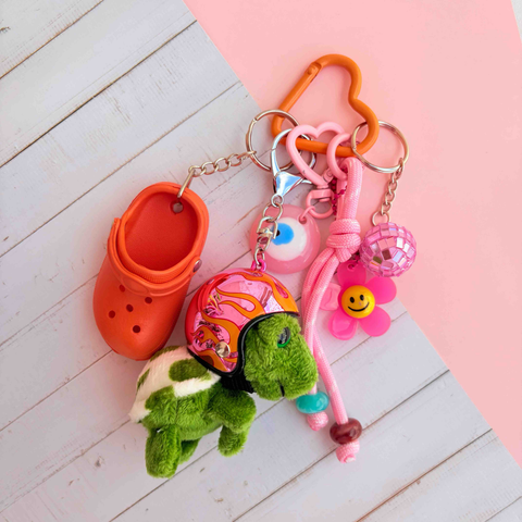 Grigri de sac crocs tortue rose et orange