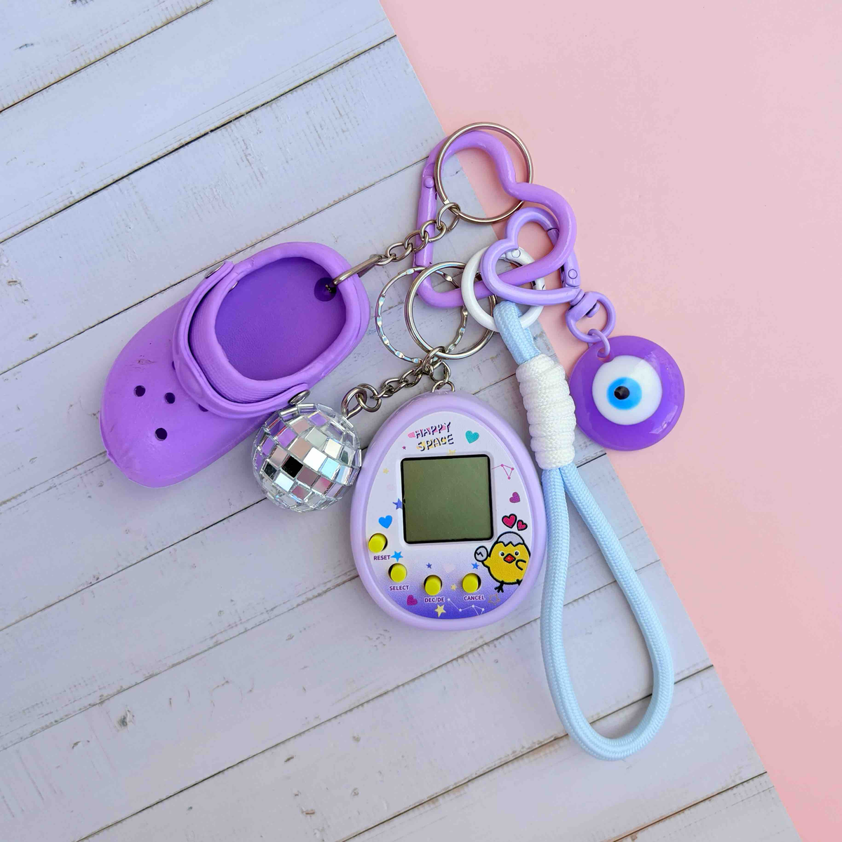 Grigri de sac Tamagotchi violet