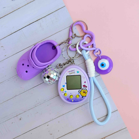 Grigri de sac Tamagotchi violet