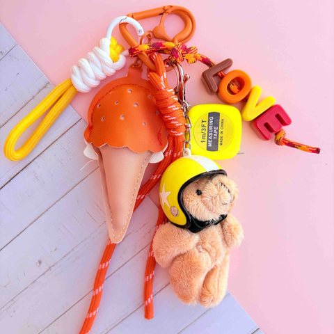 Grigri de sac ours jaune et orange