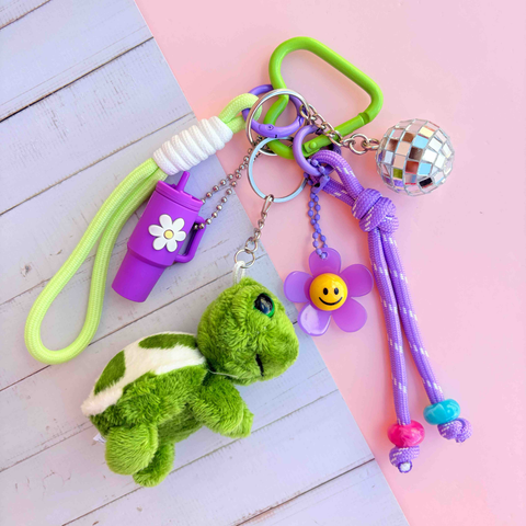 Grigri de sac crocs tortue vert et violet