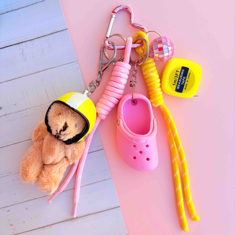 Grigri de sac ours jaune et rose